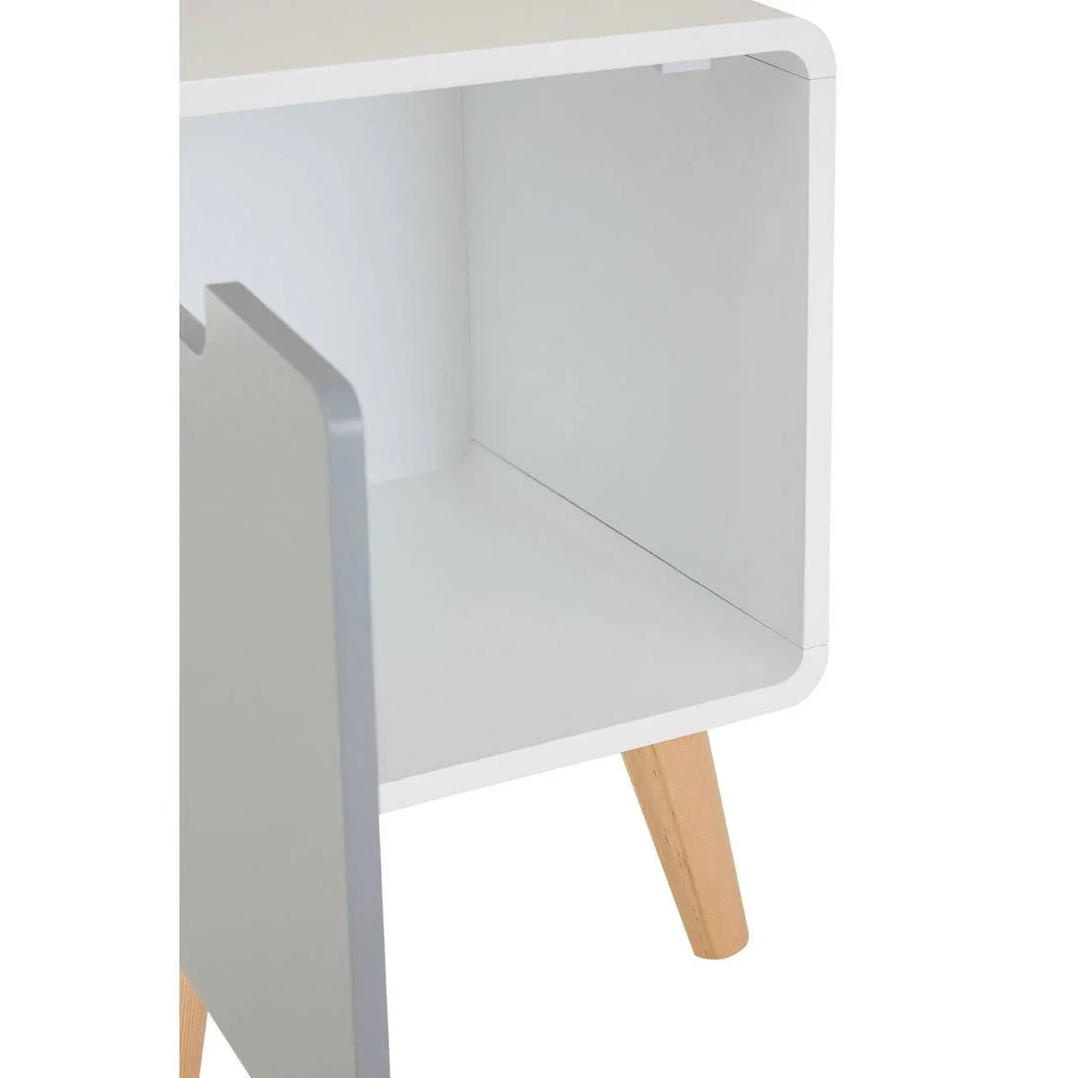 White bedside table with open storage and angled wooden legs, close-up view