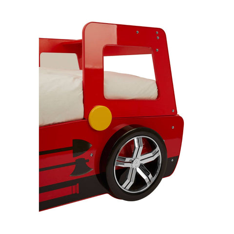 Red fire engine bed featuring a playful design with a rounded cab, a large wheel, and a bright yellow circular detail. The bed has a smooth finish and is designed to resemble a fire truck, making it a fun addition to a child's bedroom