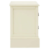 Side view of cream painted wooden storage cabinet with panel detailing
