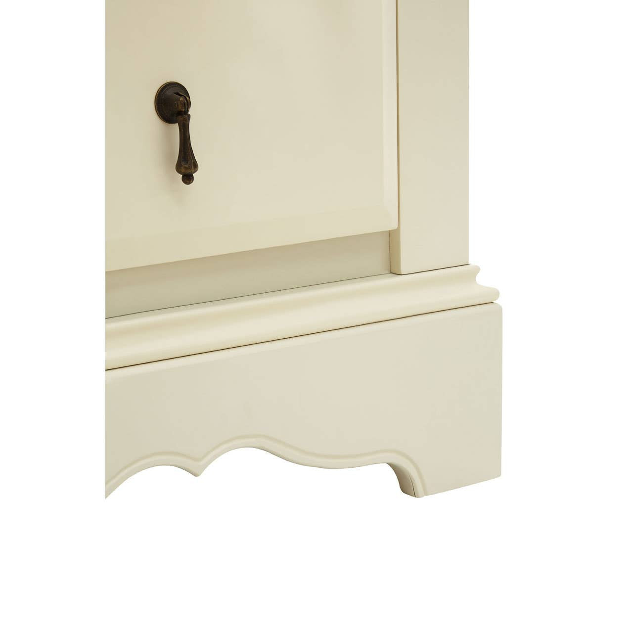 The Florence Ivory Chest features a smooth, ivory-colored finish with a decorative scalloped base. It has four spacious drawers, each adorned with a vintage-style keyhole and a dark metal handle, providing both functionality and a classic aesthetic