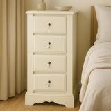 Florence Ivory Chest of 4 Drawers featuring a smooth, light ivory finish, four spacious drawers with decorative keyhole handles, and a slightly curved base, positioned beside a bed with a neutral-colored blanket and curtains in the background
