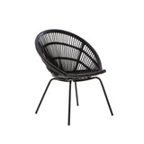 A black natural rattan chair featuring a rounded, open-weave design and sturdy iron legs, showcasing a modern and stylish aesthetic suitable for home decor