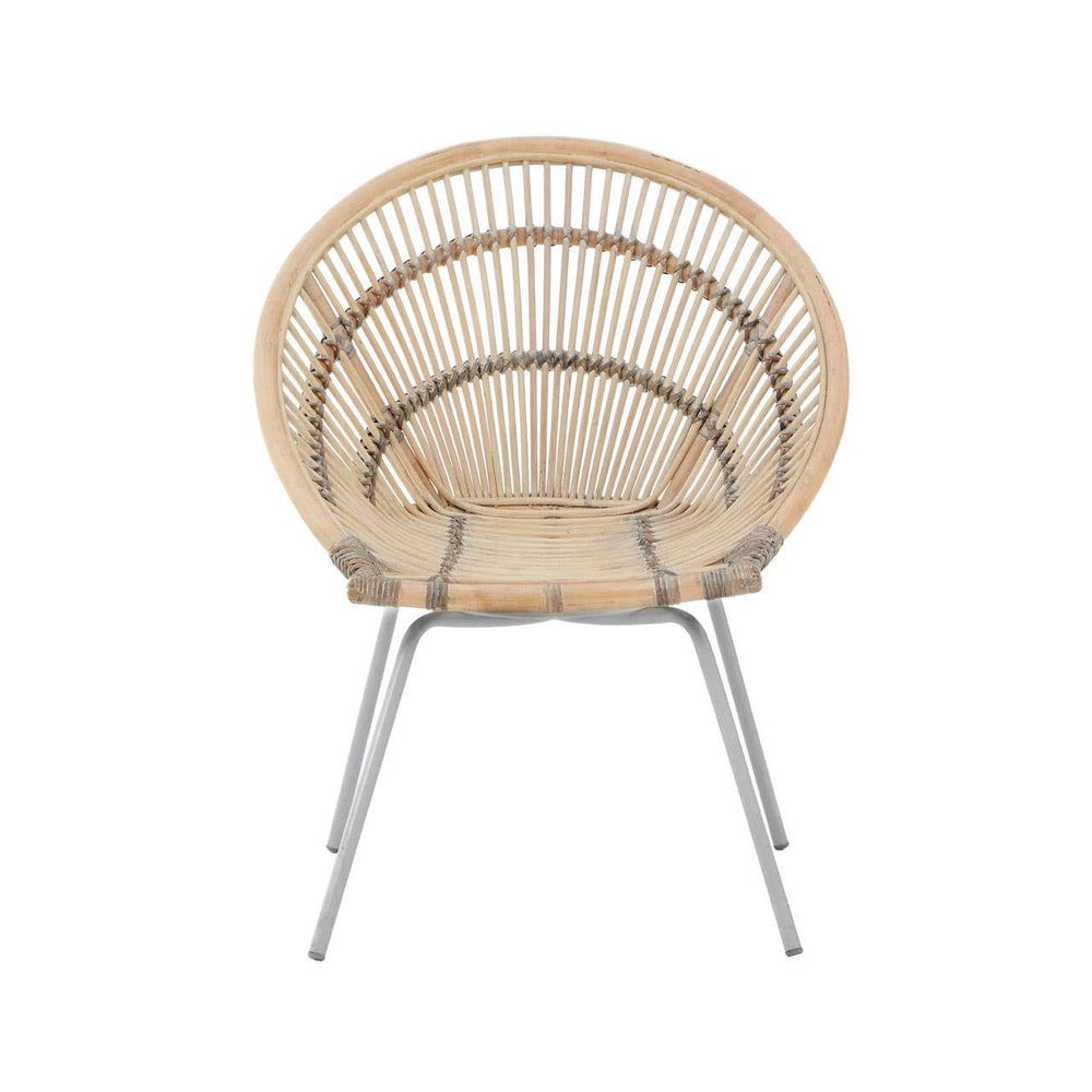 A white washed natural rattan chair with a rounded backrest and a sleek metal frame, showcasing a minimalist design that highlights the woven texture of the rattan. The chair is positioned upright, emphasizing its contemporary style and light color palette