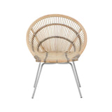 A white washed natural rattan chair with a rounded backrest and a sleek metal frame, showcasing a minimalist design that highlights the woven texture of the rattan. The chair is positioned upright, emphasizing its contemporary style and light color palette