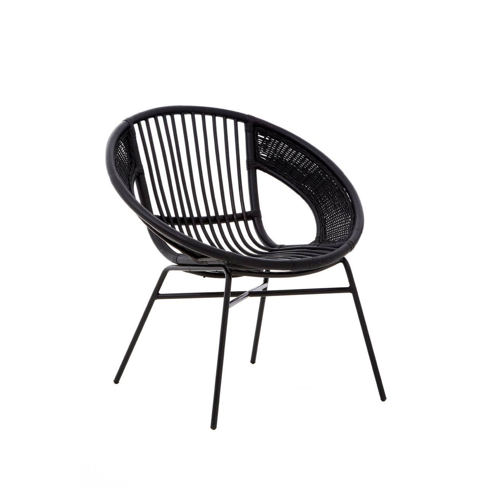 A black chair featuring a round, open design made of natural rattan and iron, with a sleek black finish. The chair has a curved backrest and slender legs, showcasing a modern and minimalist aesthetic