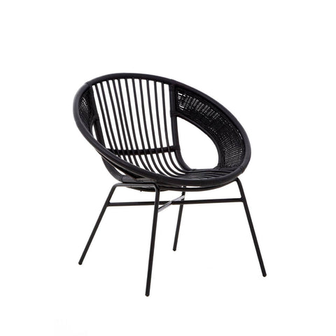 A black chair featuring a round, open design made of natural rattan and iron, with a sleek black finish. The chair has a curved backrest and slender legs, showcasing a modern and minimalist aesthetic