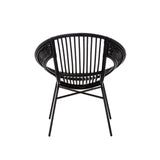 A round black chair featuring a natural rattan backrest with vertical slats and a sturdy iron frame, showcasing a minimalist design suitable for modern home decor
