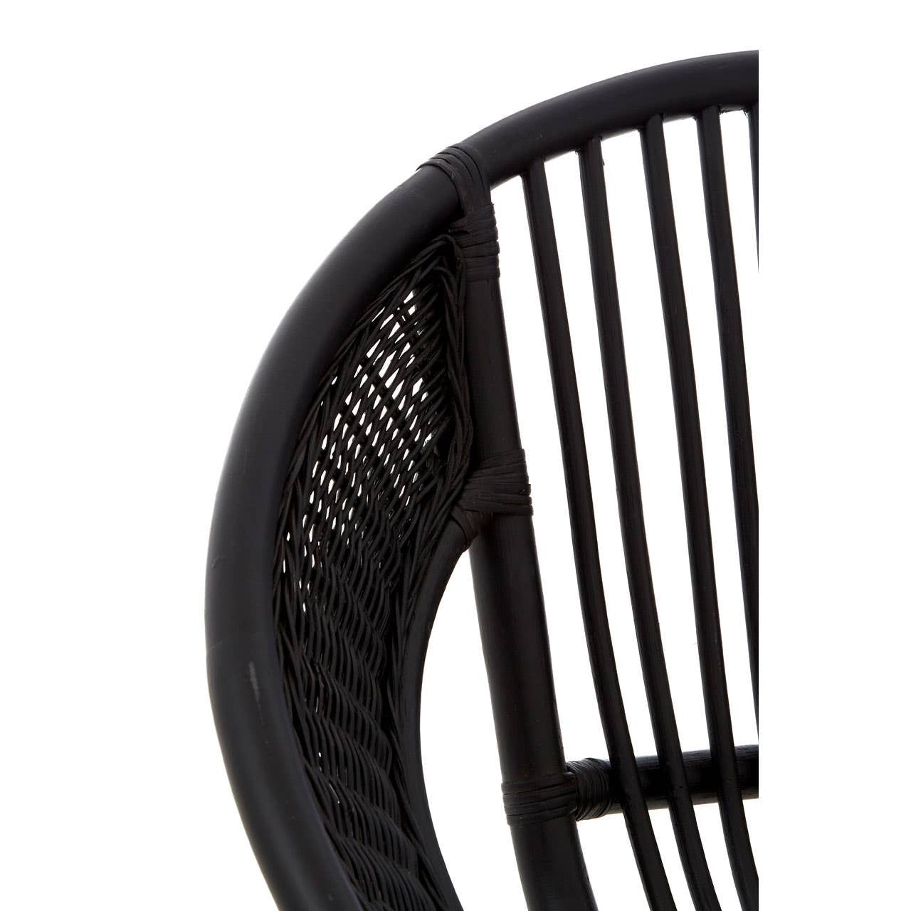 Close-up view of a black chair featuring a natural rattan seat and backrest, with sleek iron legs. The design showcases vertical slats in the backrest, emphasizing a modern and minimalist aesthetic