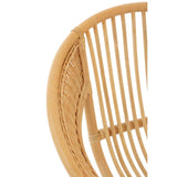 Close-up view of the Lagom Natural Rattan and Black Iron Chair, showcasing the curved rattan backrest with vertical slats and a smooth, natural finish, complemented by a sleek black iron frame