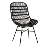 Curved black rattan chair with a slatted backrest and seat, supported by slender metal legs. The design features a modern aesthetic with a natural texture, suitable for home decor