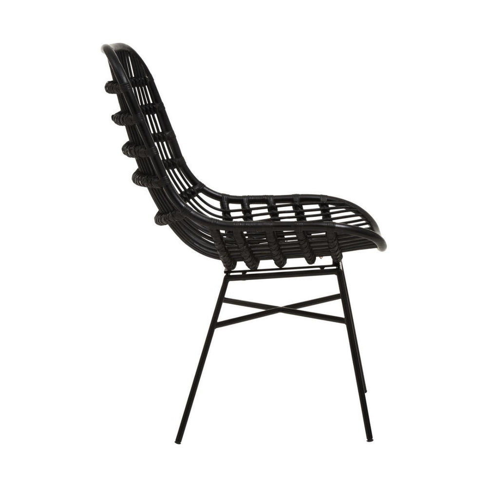 Curved black rattan chair with a natural finish, featuring a unique design with a high back and a slatted seat. The chair is supported by slender black metal legs, creating a modern and stylish look suitable for home decor