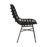 Curved black rattan chair with a natural finish, featuring a unique design with a high back and a slatted seat. The chair is supported by slender black metal legs, creating a modern and stylish look suitable for home decor