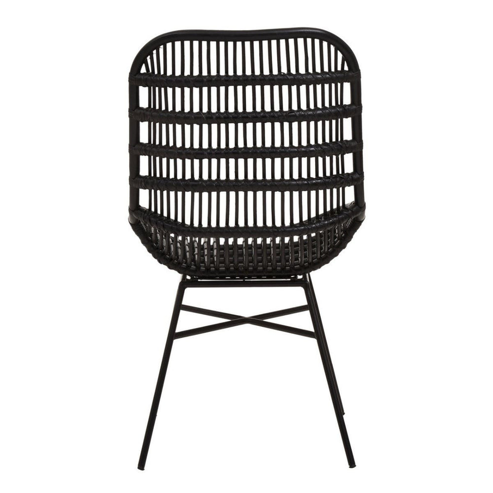 Curved black chair made of natural rattan with a slatted backrest and slender metal legs, designed for modern home decor