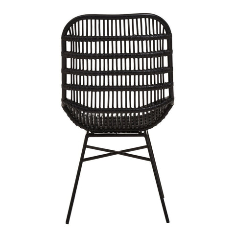Curved black chair made of natural rattan with a slatted backrest and slender metal legs, designed for modern home decor