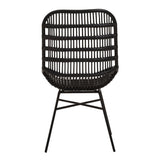Curved black chair made of natural rattan with a slatted backrest and slender metal legs, designed for modern home decor