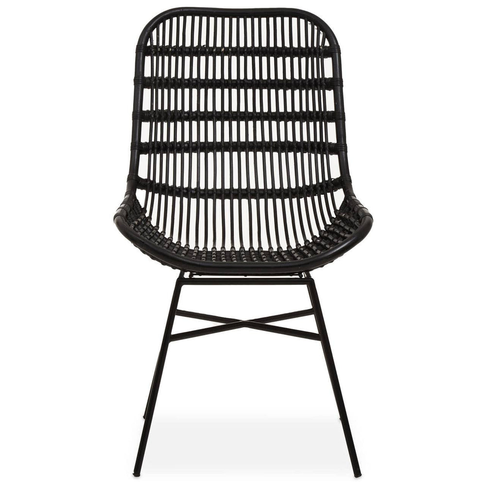 Curved black rattan chair with a natural finish, featuring a slatted backrest and a minimalist design, supported by slender metal legs