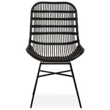 Curved black rattan chair with a natural finish, featuring a slatted backrest and a minimalist design, supported by slender metal legs