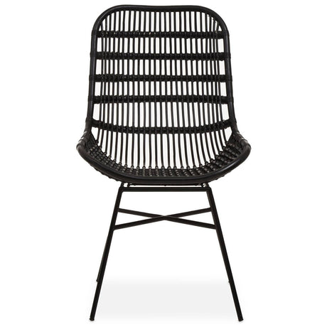 Curved black rattan chair with a natural finish, featuring a slatted backrest and a minimalist design, supported by slender metal legs