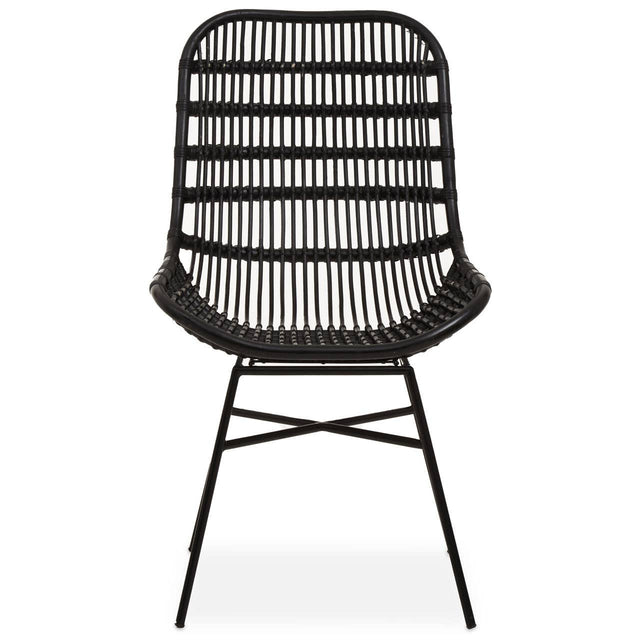 Curved black rattan chair with a natural finish, featuring a slatted backrest and a minimalist design, supported by slender metal legs