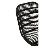 Curved black rattan chair featuring a sleek design with horizontal slats and a natural finish, showcasing the texture and craftsmanship of the rattan material