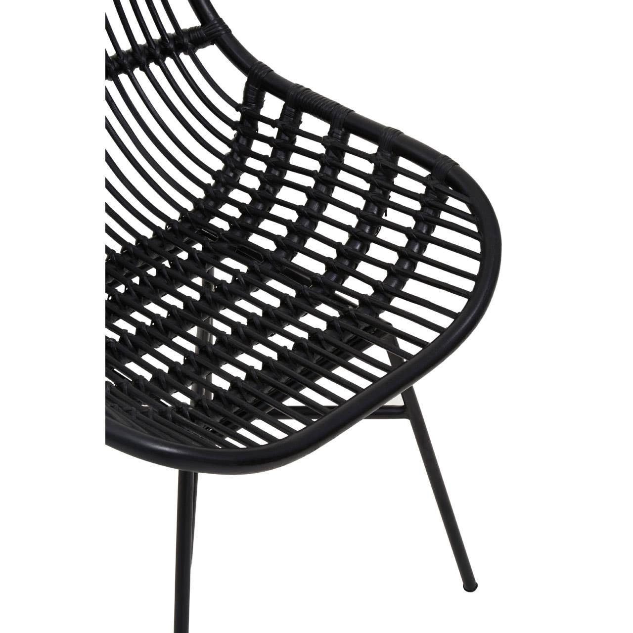 Curved black rattan chair featuring a sleek, open-weave design with a modern aesthetic, supported by slender black metal legs. The chair's shape emphasizes comfort and style, making it suitable for various home decor settings
