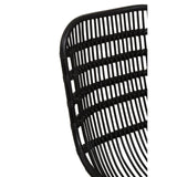 Curved black rattan chair showcasing a sleek design with horizontal slats and a natural finish, emphasizing its modern aesthetic and comfortable structure
