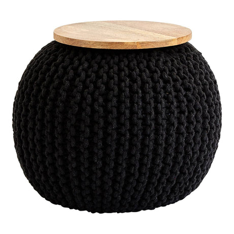 A round black knitted pouffe with a textured surface and a light wooden top, suitable for use as a stool or side table