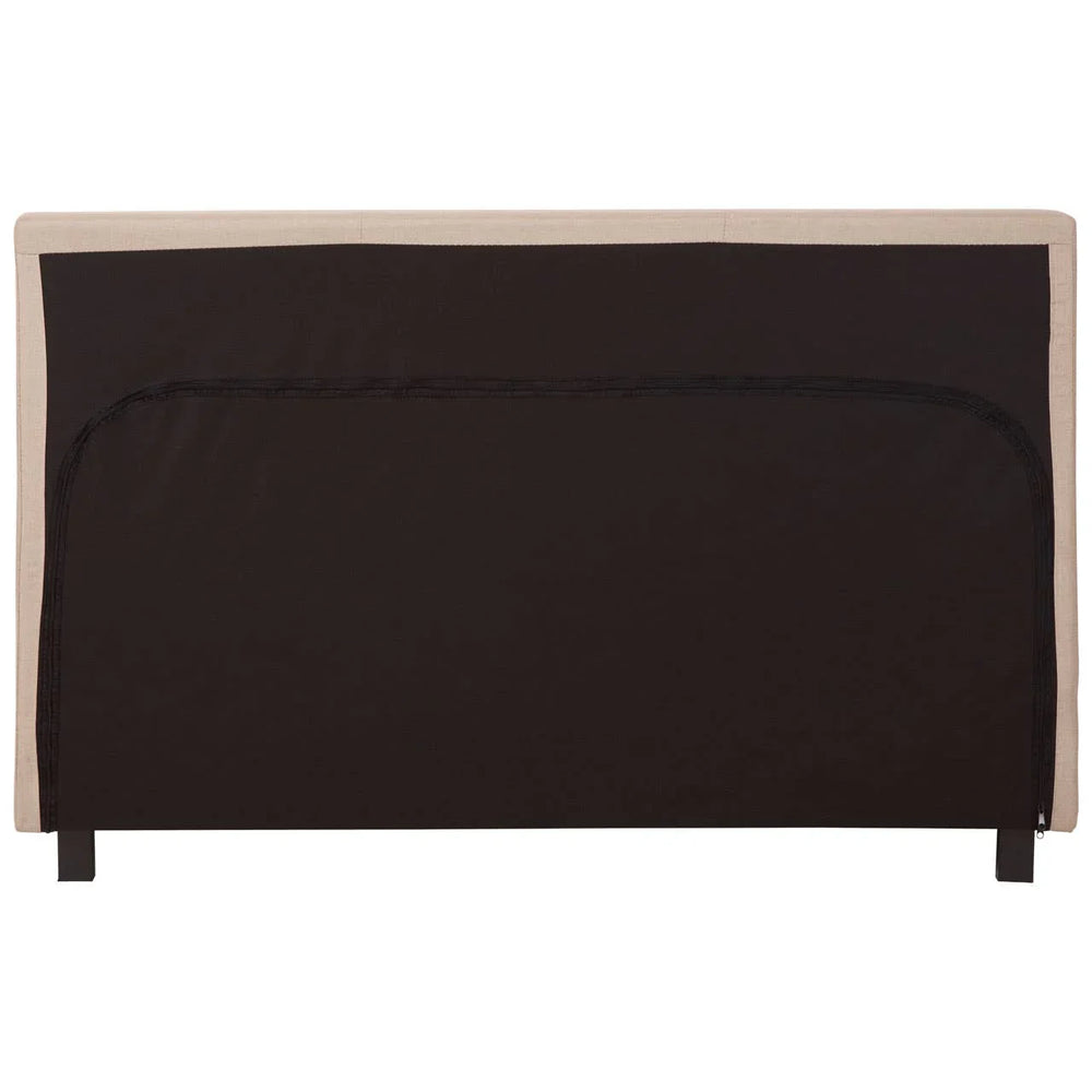 Rear view of upholstered fabric headboard with beige frame and black backing panel