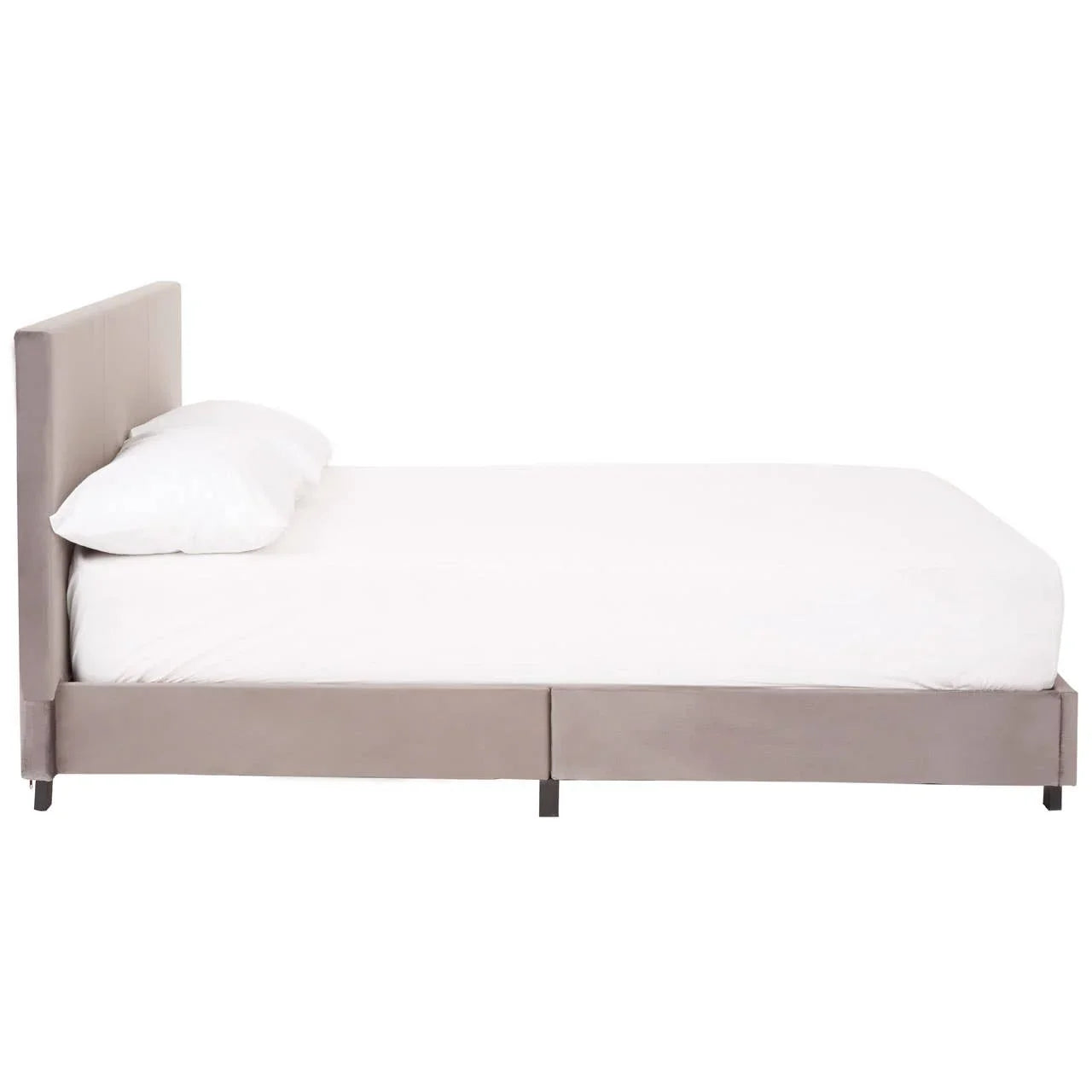 Side view of grey upholstered bed frame with white mattress and pillow