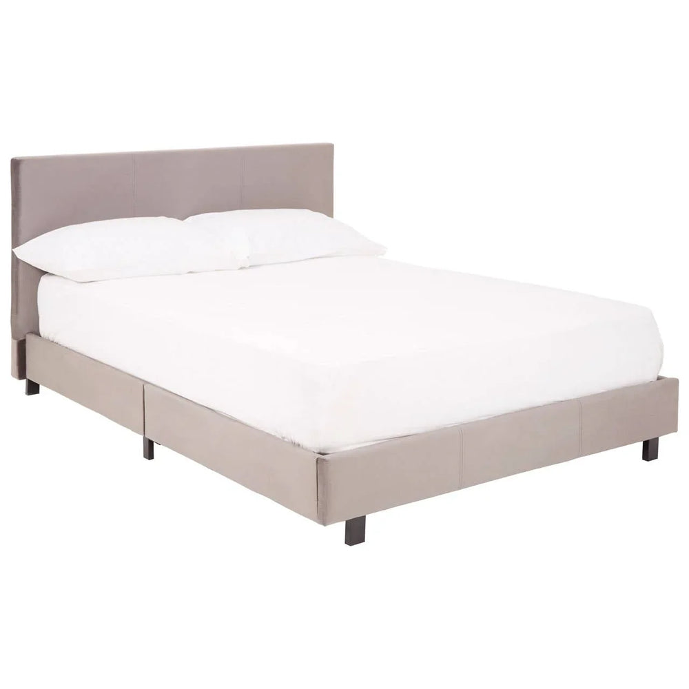 Grey upholstered bed frame with headboard and white bedding, side angle view