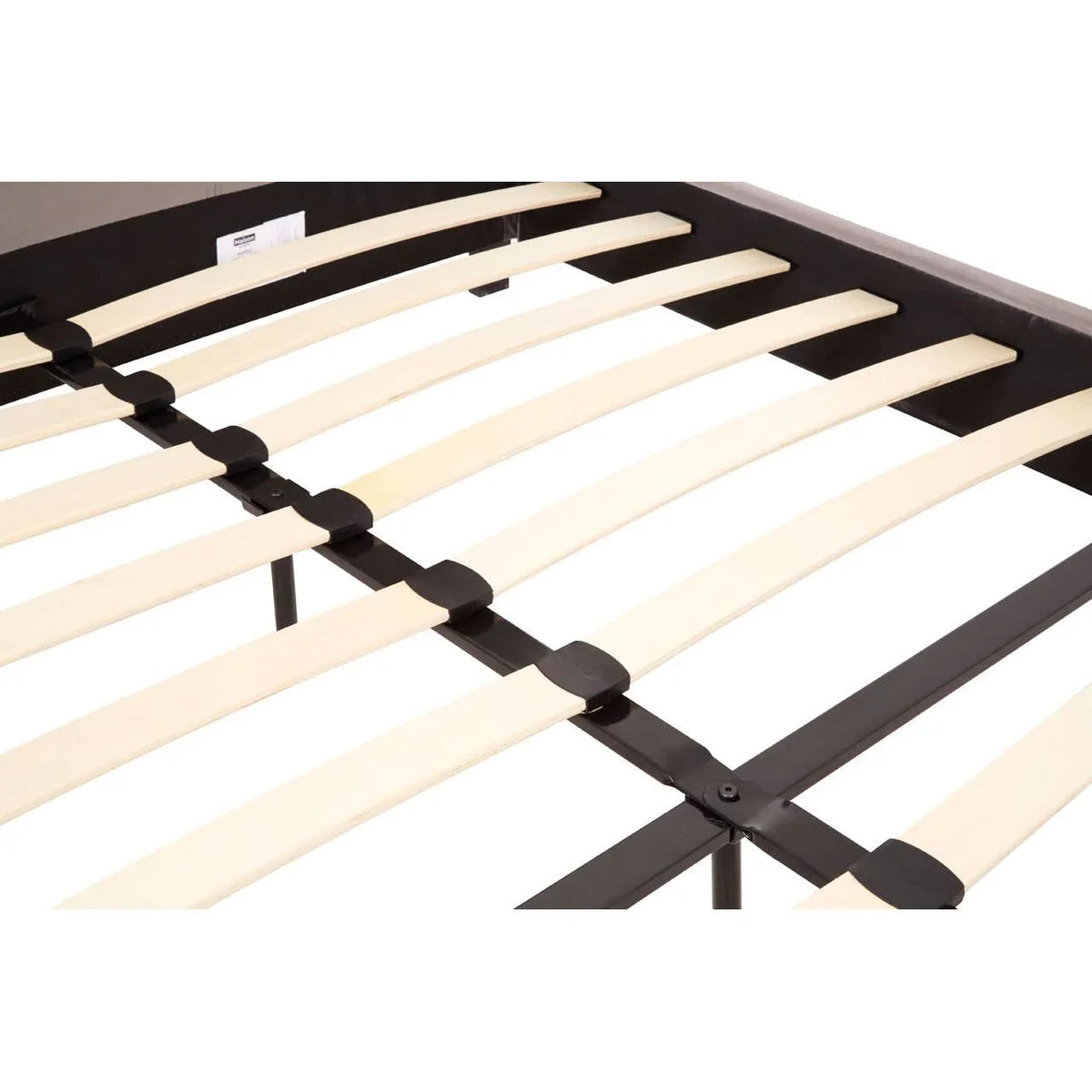 Closeup of wooden bed frame slats with black metal support structure