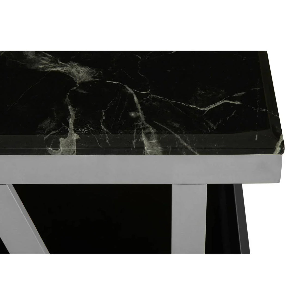 Black marble tabletop with chrome metal frame corner detail
