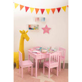 A bright yellow giraffe-shaped stool stands next to a pink children's table and chairs set, decorated with colorful bunting overhead. The wall features a pink star decoration and various colorful items on a shelf, creating a playful and vibrant atmosphere suitable for a kids' room