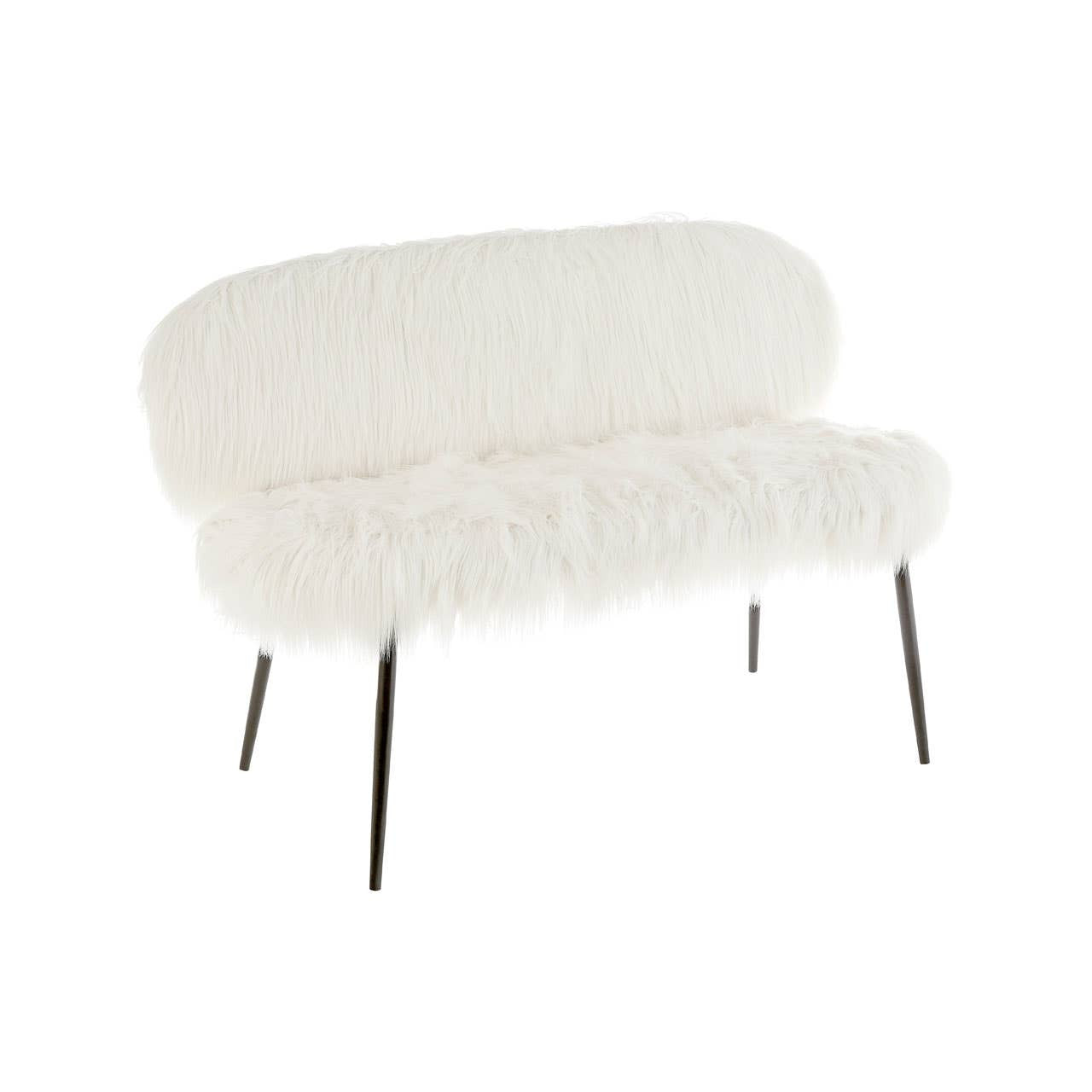 A two-seater sofa featuring a plush faux fur upholstery in a soft white color, with a rounded backrest and a sleek, minimalist design. The sofa is supported by slender black legs, adding a modern touch to its overall appearance