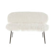 A two-seater sofa upholstered in soft faux fur, featuring a rounded backrest and plush seat cushions. The sofa is supported by sleek black legs, adding a modern touch to its cozy design. The overall color is a light cream, enhancing its inviting appearance