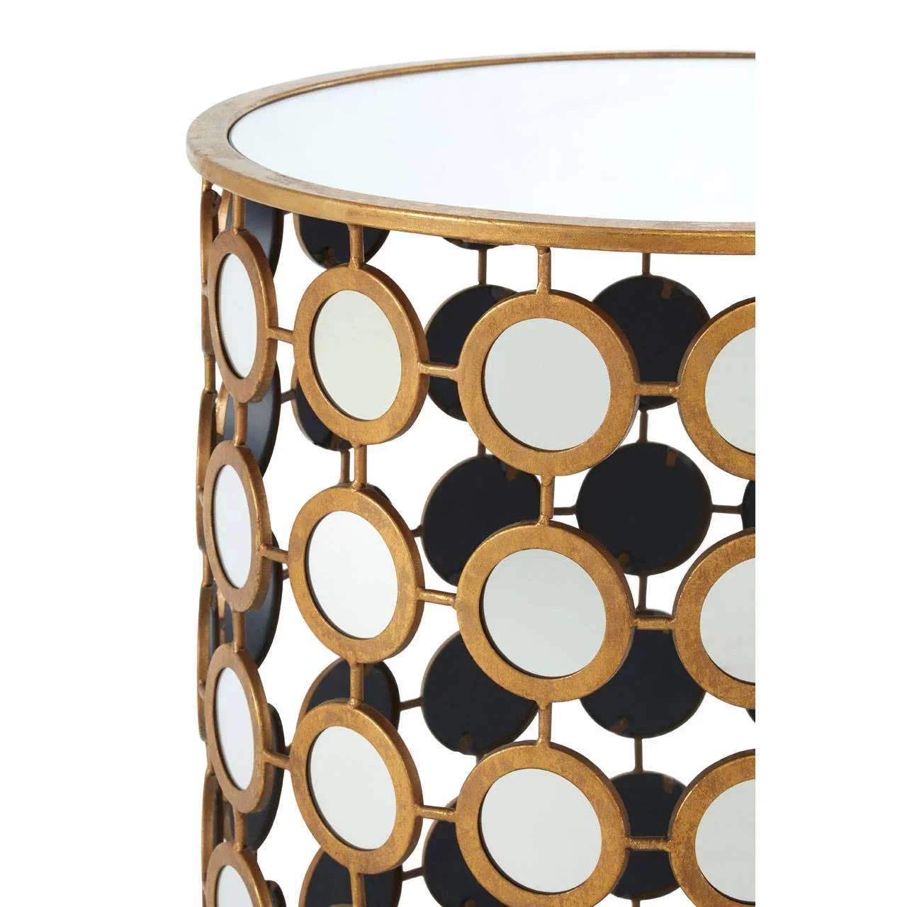 Round side table with gold metal frame and circular mirrored accents
