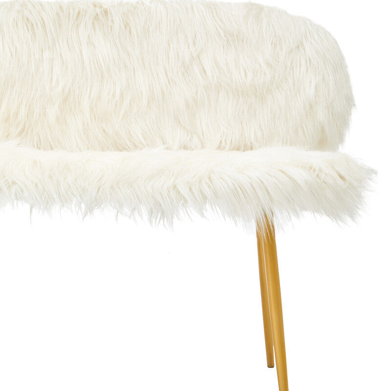 A plush white faux fur two-seat sofa featuring sleek gold finish legs, showcasing a modern and luxurious design. The soft texture of the upholstery contrasts with the shiny metallic legs, creating an elegant look suitable for contemporary home decor