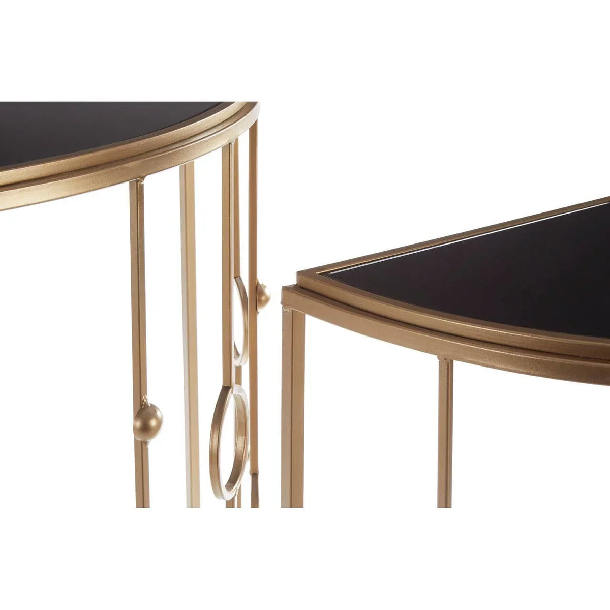 Black glass console table with gold metal frame and decorative geometric accents, side angle view
