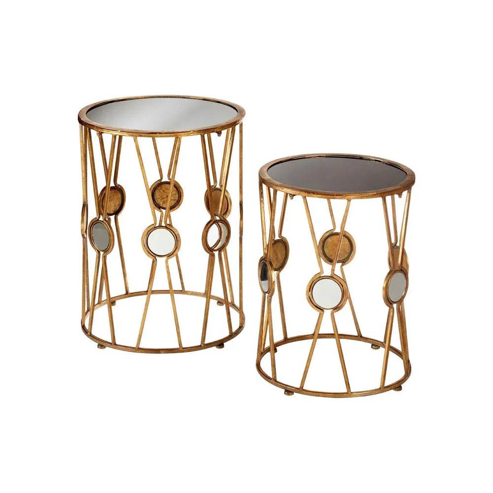 Set of two round gold metal side tables with mirrored tops and geometric frames