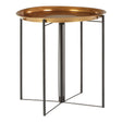A large side table featuring a round brass top with a shiny finish, supported by a sleek black metal frame with four legs. The design is modern and minimalist, showcasing a combination of materials that adds elegance to any space