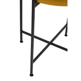 Small side table featuring a round top with a brass finish and slender black metal legs. The legs are designed with a crossbar for added stability, showcasing a modern and minimalist aesthetic