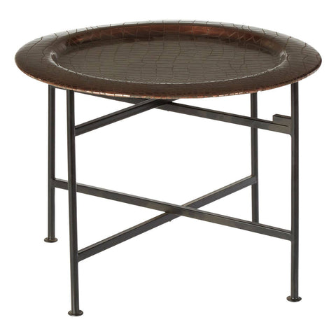 Round side table featuring a copper finish with a crocodile texture on the top surface. The table has a sturdy black metal frame with crossed legs for support. The design is sleek and modern, suitable for various home decor styles