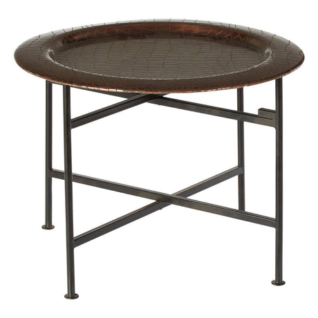 Round side table featuring a copper finish with a crocodile texture on the top surface. The table has a sturdy black metal frame with crossed legs for support. The design is sleek and modern, suitable for various home decor styles