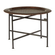Round side table featuring a copper finish with a crocodile texture on the surface. The table has a sturdy metal frame with a crossbar design for support, and it stands on four slender legs. The overall design is modern and stylish, suitable for various home decor settings