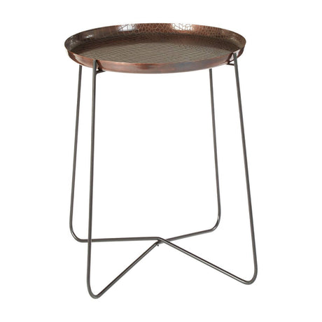 Round side table featuring a copper finish with a crocodile texture on the surface, supported by slender black metal legs that form a geometric design. The table has a smooth, reflective top and a modern aesthetic suitable for various home decor styles