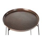 Round side table featuring a copper finish with a crocodile texture on the surface, complemented by slender black legs. The table has a raised edge and a smooth, patterned top, ideal for decorative items or drinks