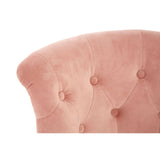 Soft pink velvet upholstery with a curved backrest featuring button tufting, designed for a kids' chair