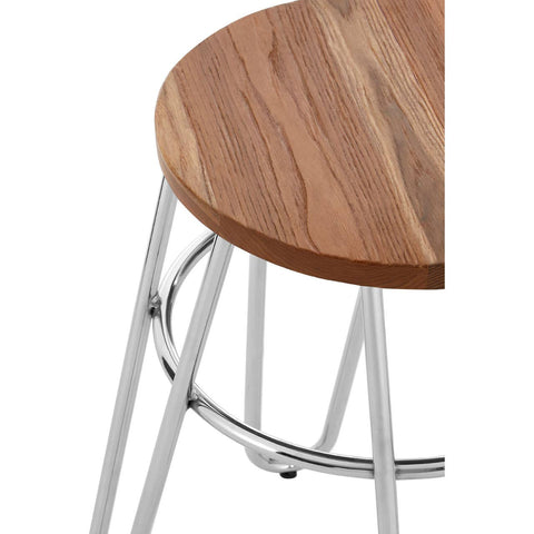 Round wooden stool top with a smooth, natural finish, supported by sleek, silver hairpin legs. The design features a circular shape and a minimalist aesthetic, showcasing the contrast between the warm wood and the metallic legs