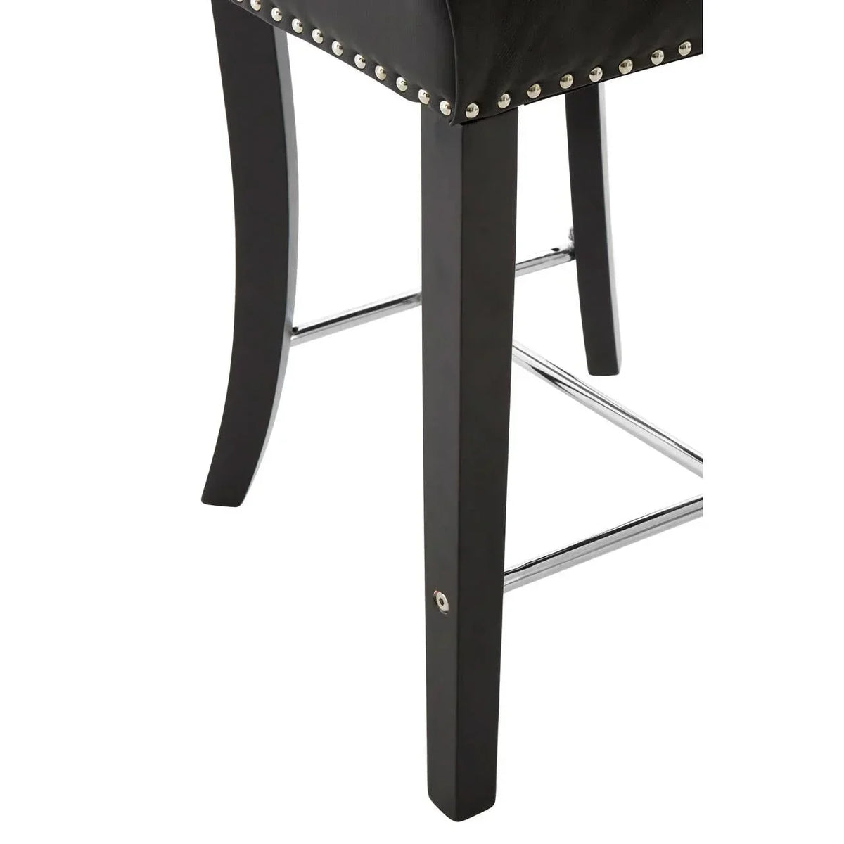 Black bar stool leg with chrome footrest and metal stud detailing on seat edge