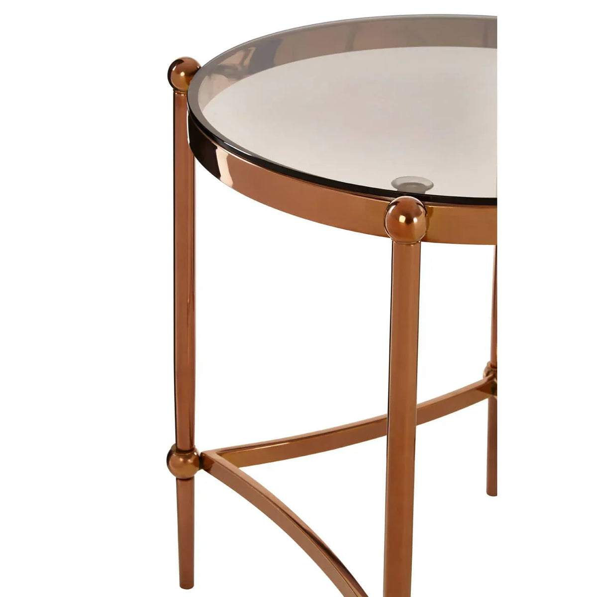 Round glass top side table with gold metal frame and crossed base detail